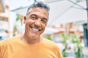 Man smiling after dental care